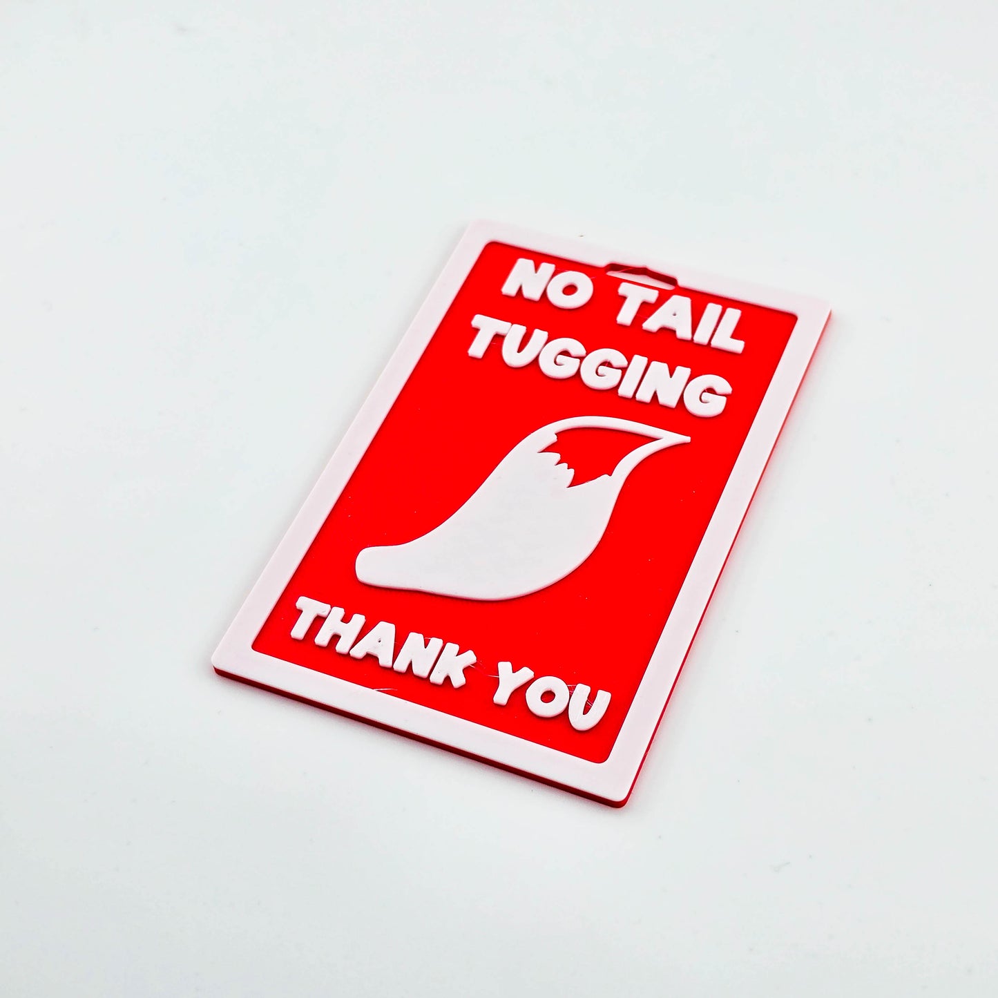 No Tail Tugging Badge
