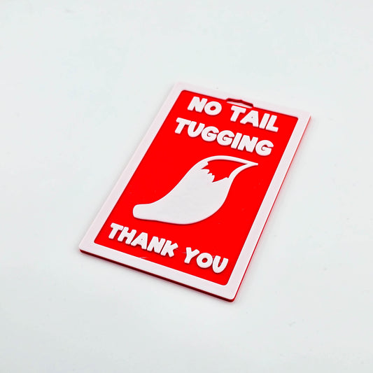 No Tail Tugging Badge