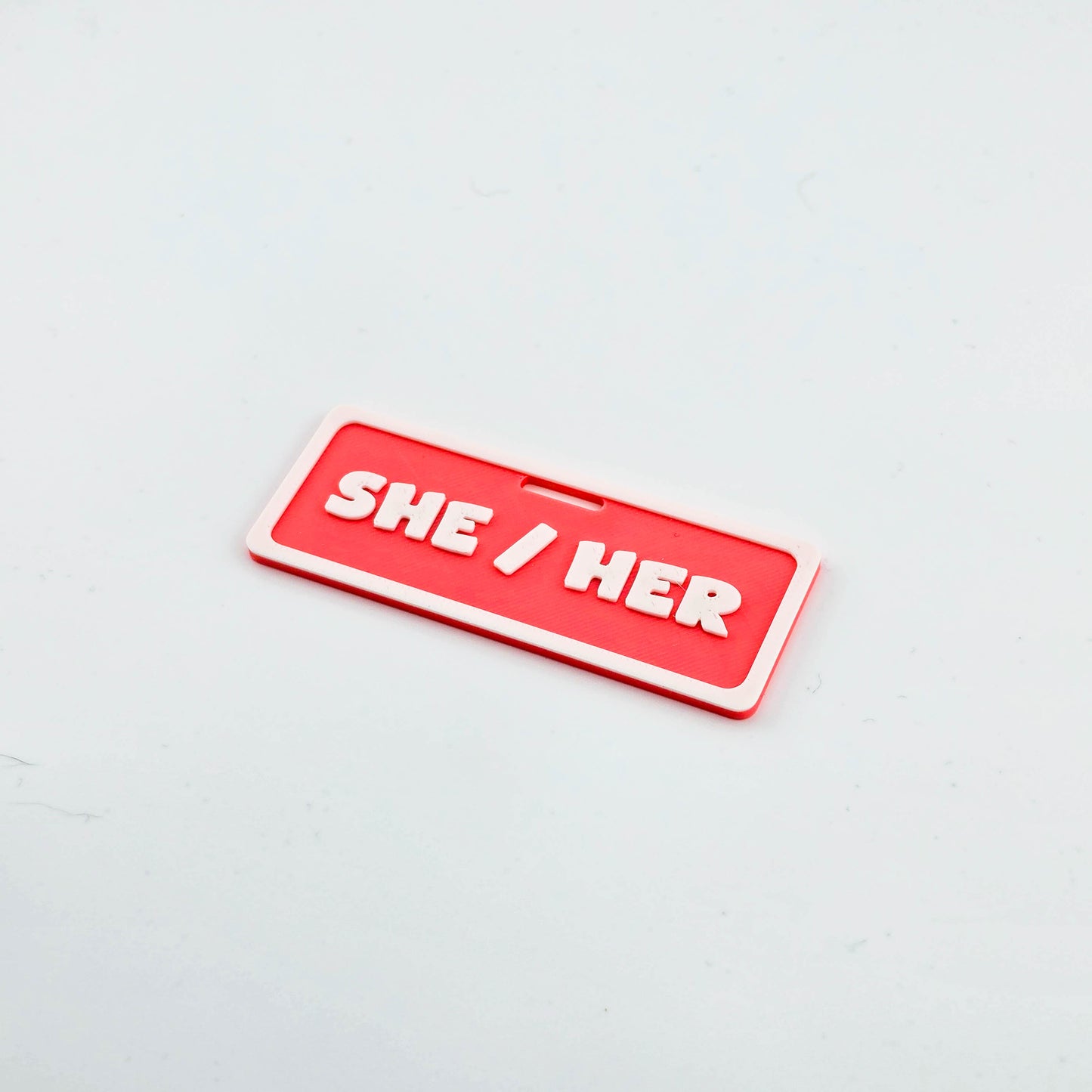 She / Her Pronoun Badge